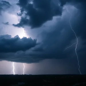 A severe thunderstorm looming over Charleston with dark skies and lightning.
