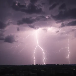 Dark storm clouds with lightning above Florence city