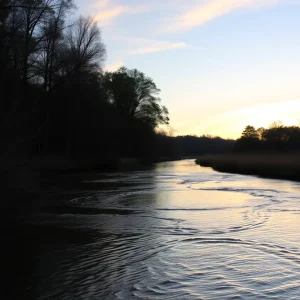 Serene view of Skull Creek with a sunset sky
