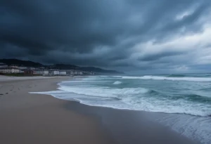 Dark clouds over a beach indicating an approaching winter storm