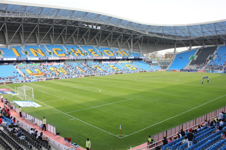 Soccer stadium with pitch and stands